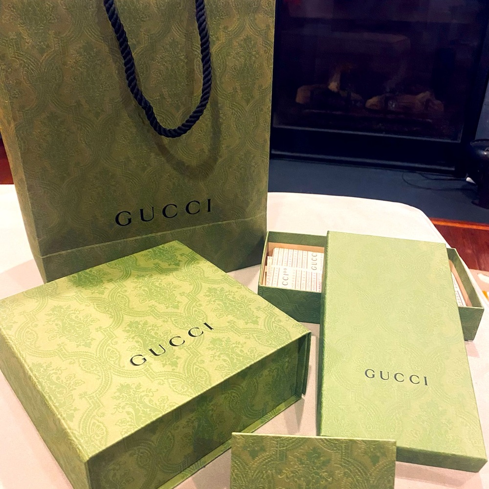Authentic Gucci boxes and bags.